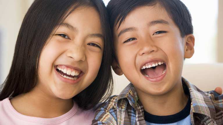 Two laughing children | palos heights dentist