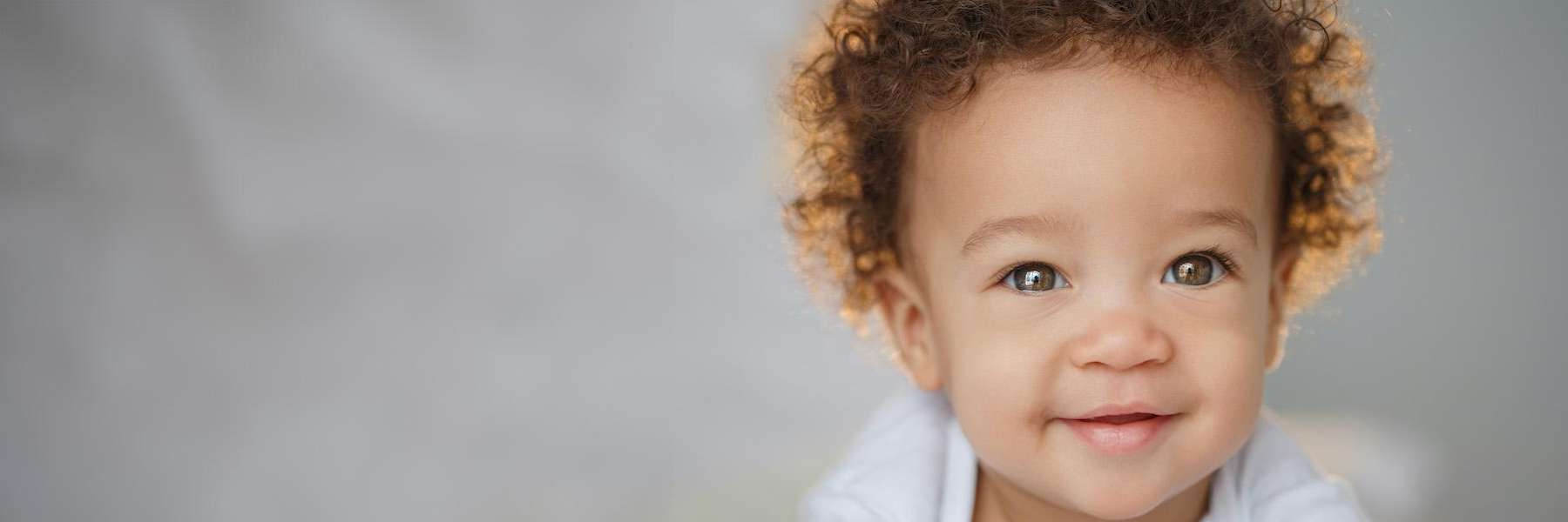 Baby with a small smile, palos heights il
