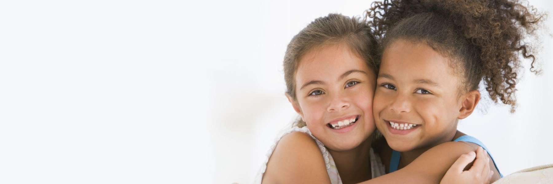 Two girls smiling embracing each other, palos heights il